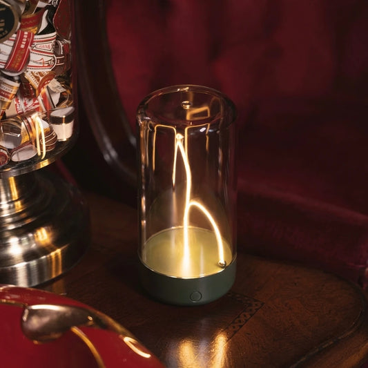 Portable USB-C mood lamp glowing on a nightstand