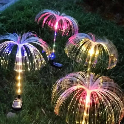 Solar jellyfish flower garden stakes at night