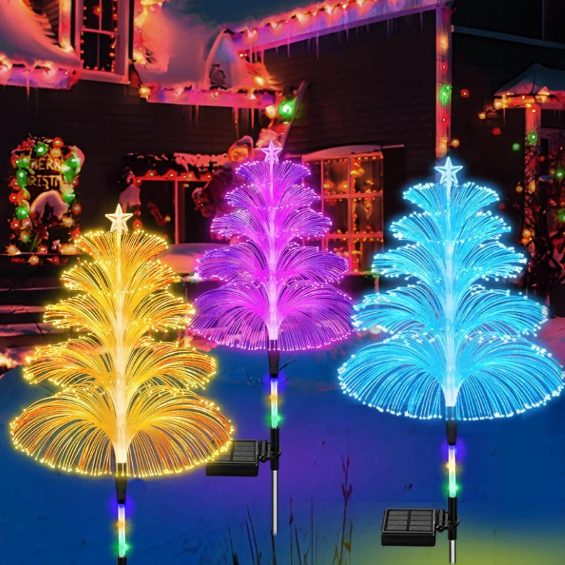 Jellyfish pathway lights glowing in the yard