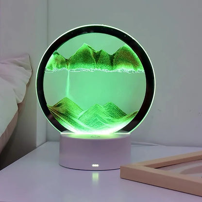 Sandscape night light glowing in a dark room
