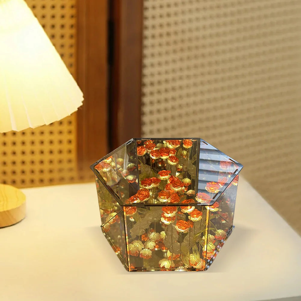 Tulip rose mirror cube glowing on a desk