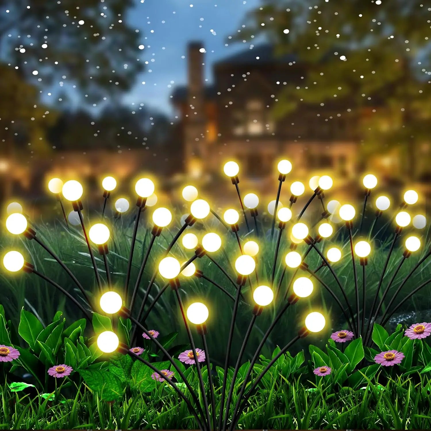 Solar firefly garden lights glowing at night